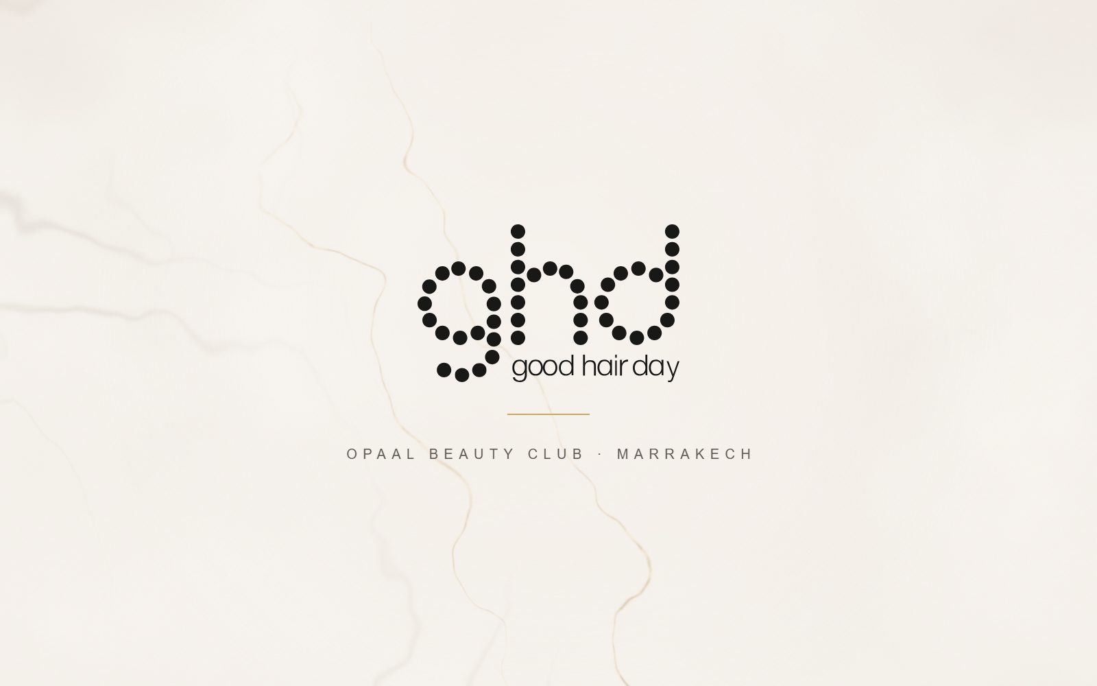 Logo ghd, partenaire outils coiffants d’OPAAL Beauty Club