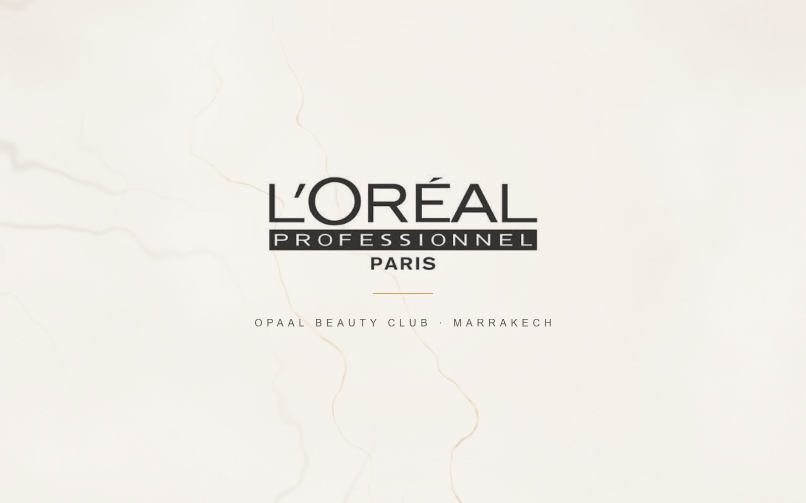 Logo L’Oréal Professionnel, partenaire couleur et soins capillaires d’OPAAL Beauty Club
